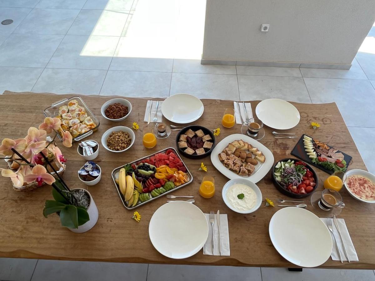 Oikos Boutique Residences Plateies Bagian luar foto